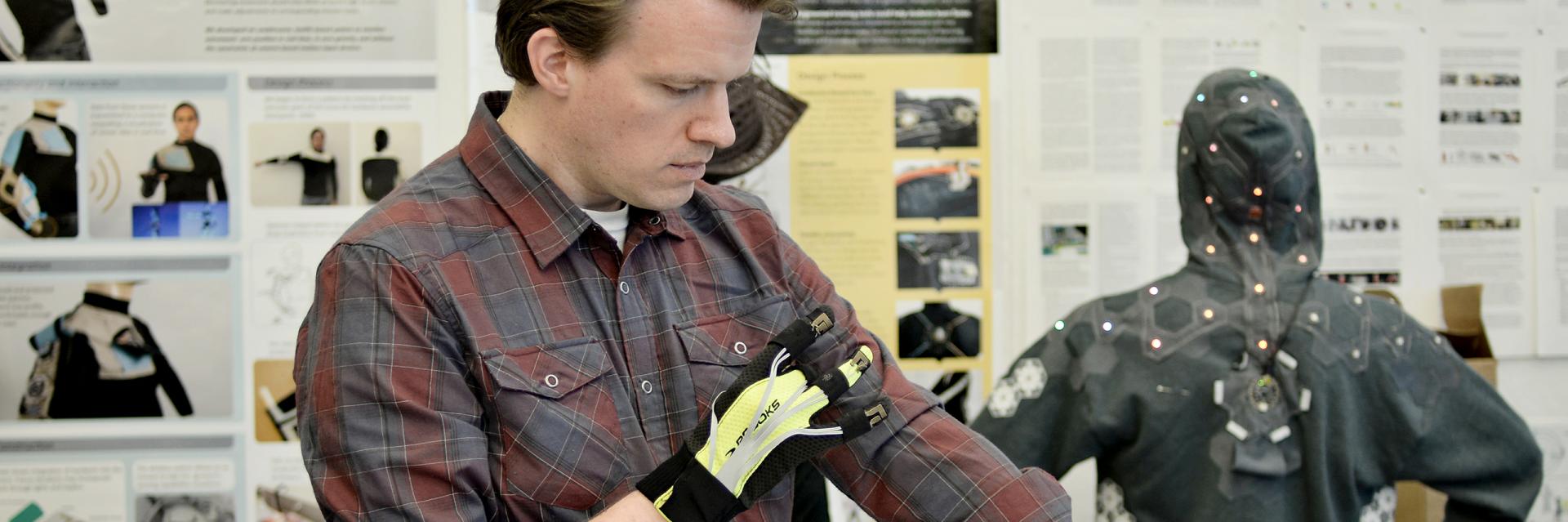 James Hallam wearing a rehabilitation glove